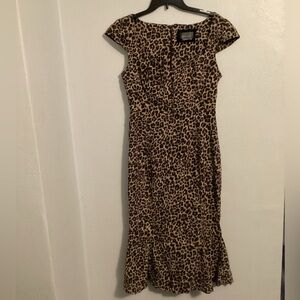 Anthropology NWOT Woman's Brown Animal Print Tea Length Dress. Size Medium.